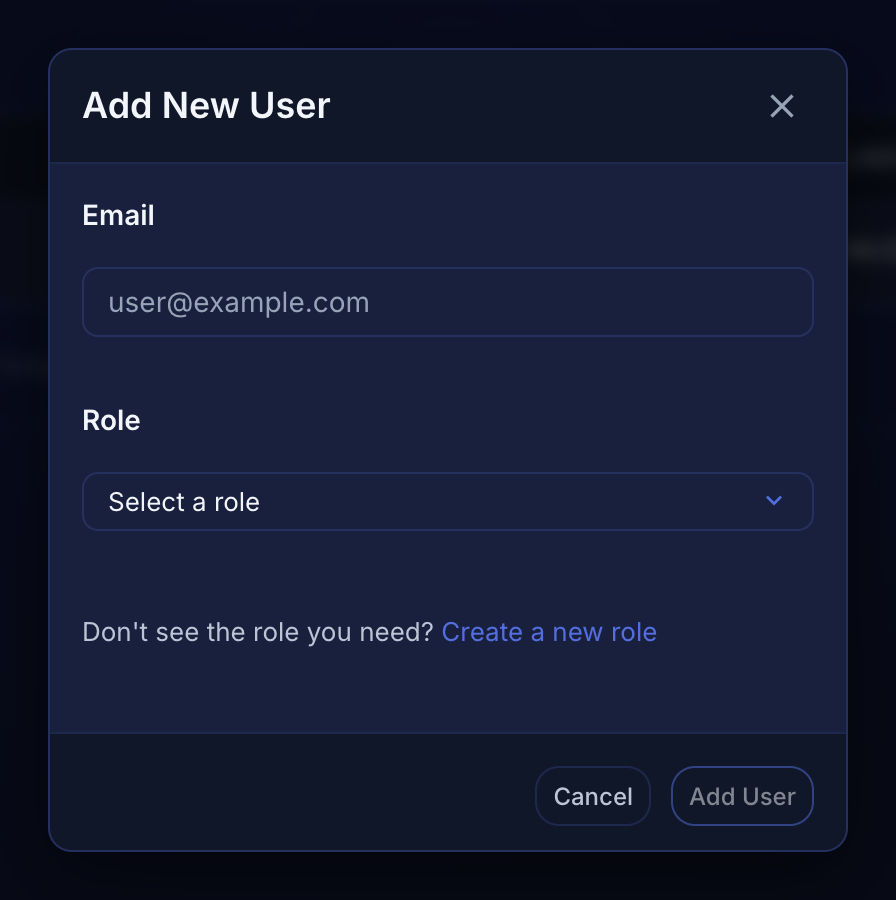 The Add New User dialog with an email field and a role selector